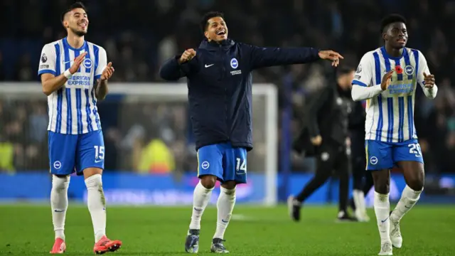 Jakub Moder, Georginio Rutter and Carlos Baleba celebrating for Brighton