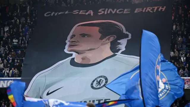 A general view as fans of Chelsea raise a banner which reads "Chelsea Since Birth" and features Conor Gallagher