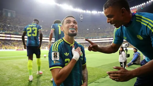 Daniel Munoz celebrates a goal for Colombia