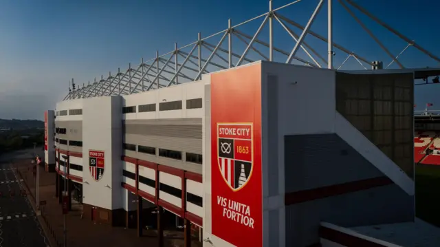 A picture of the outside of Stoke's home ground the bet365 Stadium showing the new badge in two locations on the wall.