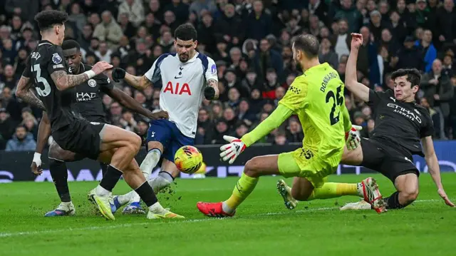Dominic Solanke scoring against Manchester City