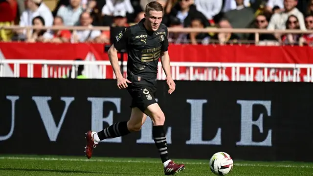 Adrien Truffert in action for Rennes