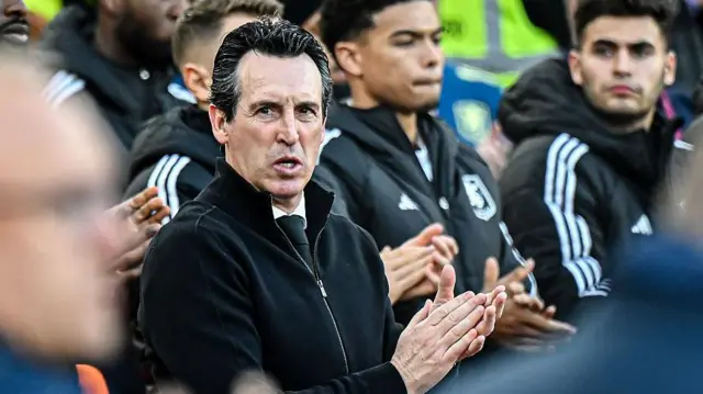 Unai Emery applauds before match against Manchester United