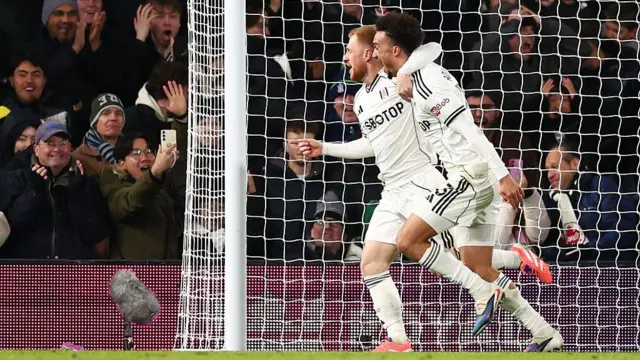 Harrison Reed celebrates with Antonee Robinson 