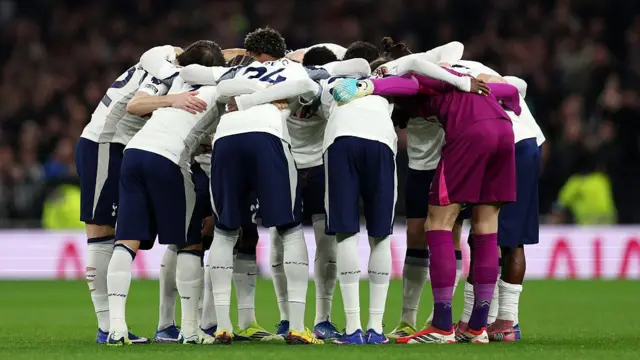 Tottenham players in a huddle