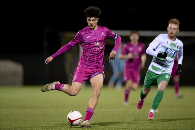 Swansea City Under-21s player Filip Lissah strikes the ball