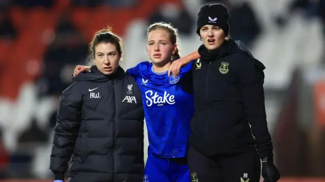 Issy Hobson with medical staff on Wednesday 