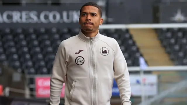 Manuel Benson arrives at a Swansea game