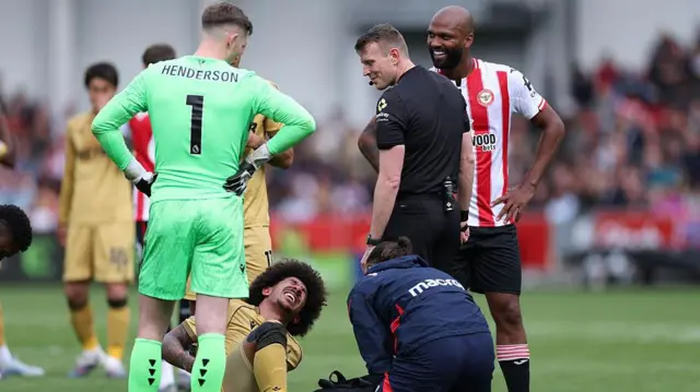 Chris Richards goes down with an injury in Crystal Palace's Premier League draw at Brentford.
