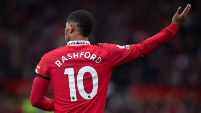 Marcus Rashford from behind wearing Manchester United's number 10 shirt
