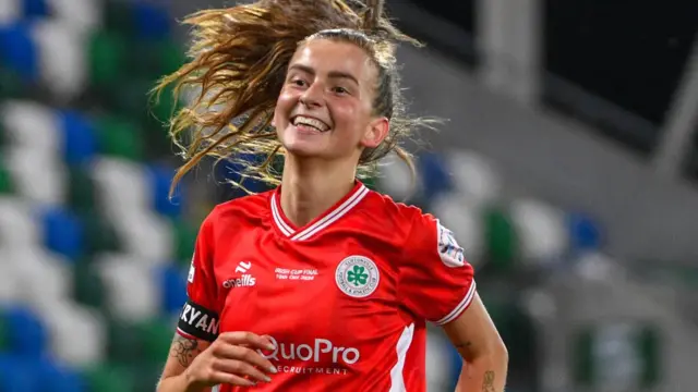 Caitlin McGuinness celebrates