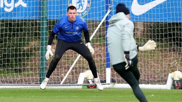 Gabriel Slonina braces himself for a shot from the coaching staff