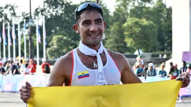 Brian Daniel Pintado celebrates winning the race walk at the Olympics