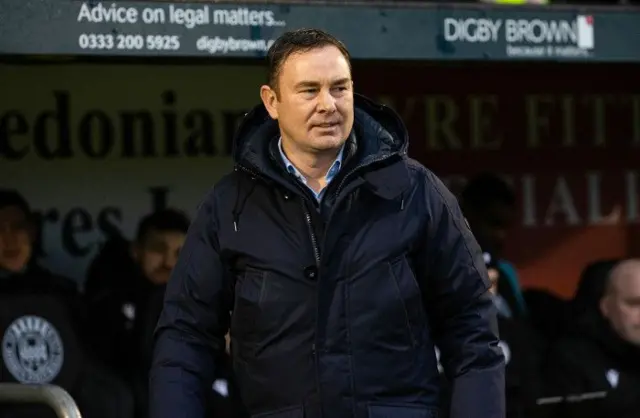 Derek Adams watches on at the SMiSA Stadium.