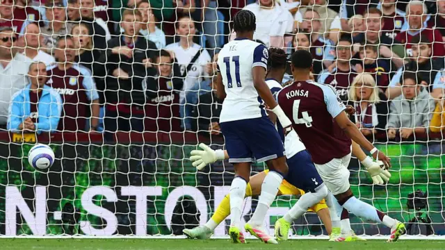 Ezri Konsa of Aston Villa scores the opening goal