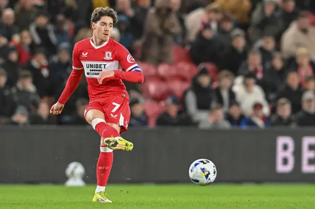 Hayden Hackney playing a pass during a game for Middlesbrough