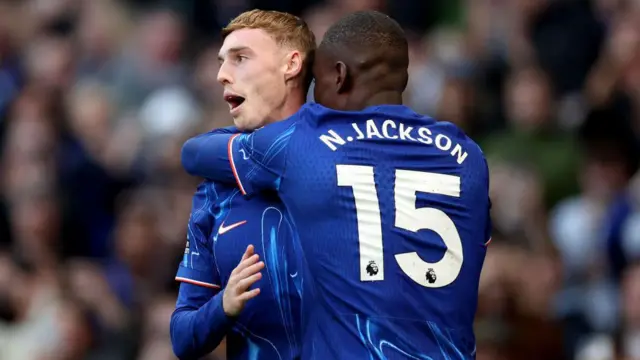 Cole Palmer of Chelsea celebrates scoring his team's second goal with team mate Nicolas Jackson during the Premier League match between Chelsea FC and Newcastle United FC at Stamford Bridge