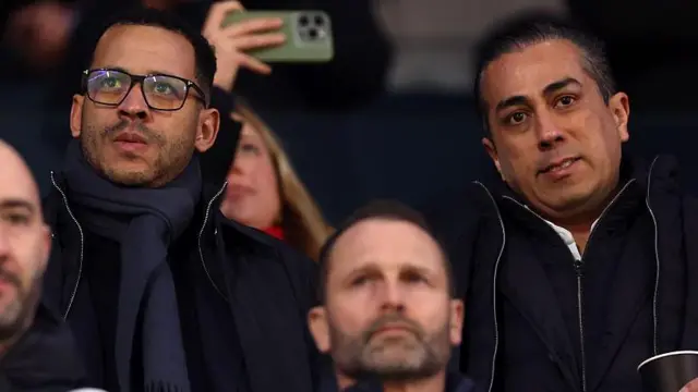Liam Rosenior, incoming manager of Chelsea, and co-owner Behdad Eghbali look on