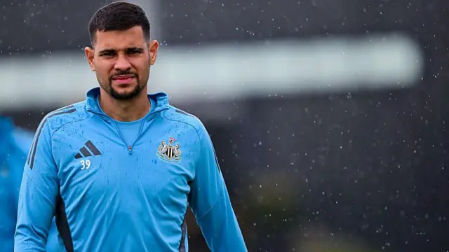 Bruno Guimaraes walks outside to begin training  at the Newcastle United Training Centre 
