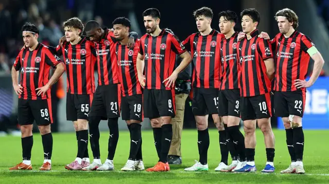 Players of FC Midtjylland look on during the penalty shootout in the Europa League round of 16 second leg against Nottingham Forest