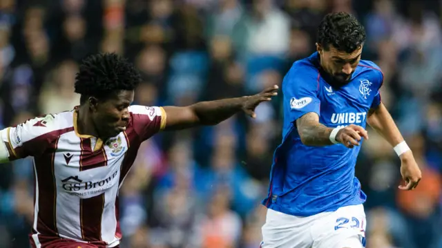 St Johnstone's Aaron Essel and Rangers' Jefte