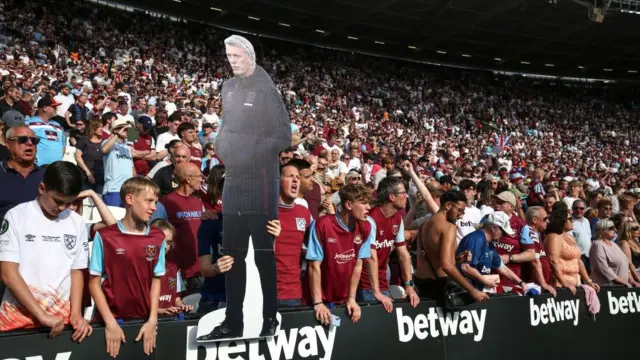 West Ham fans with a Dvaid Moyes cardboard cut out 