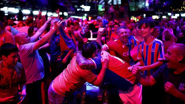 Crystal Palace fans watch Europa Conference League final back at a venue in Croydon. 