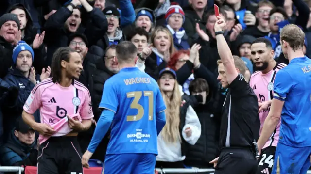 Leicester City's Bobby De Cordova-Reid is shown a red card during the 2-1 defeat at Birmingham City