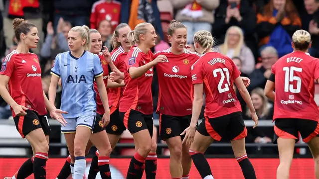 Maya Le Tissier of Manchester United celebrates scoring her team's third goal. 