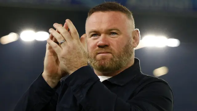 Plymouth Argyle manager Wayne Rooney applauds the travelling supporters after their 3-0 defeat by Leeds United at Elland Road