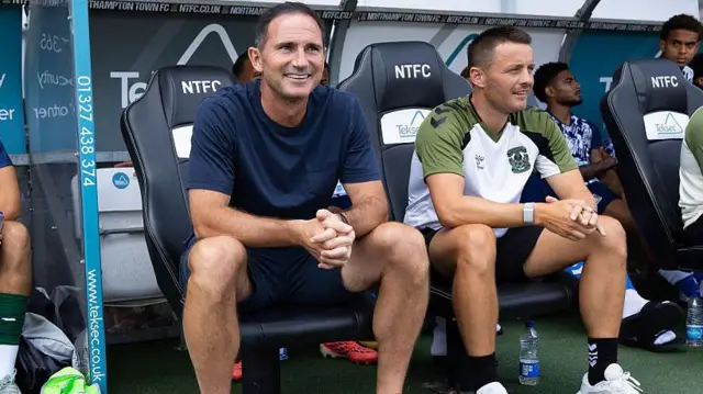 Frank Lampard looks on from the dugout 