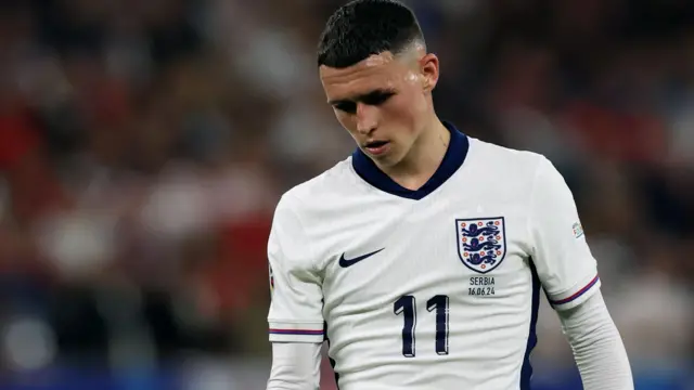 Phil Foden looks dejected for England