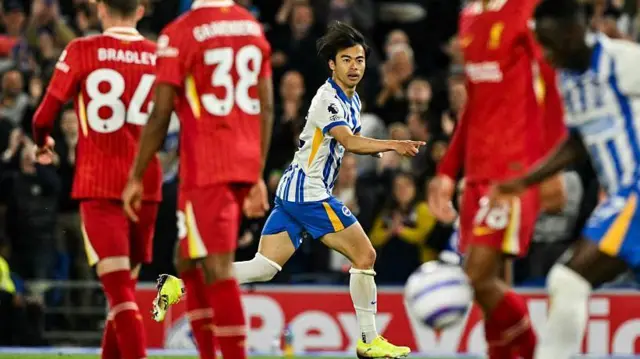 Kaoru Mitoma celebrates a goal