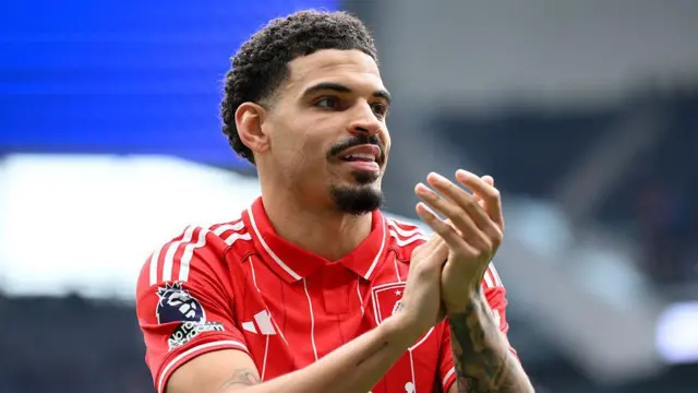 Morgan Gibbs-White applauds the fans