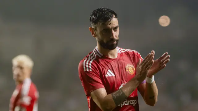 Bruno Fernandes applauds fans in Hong Kong