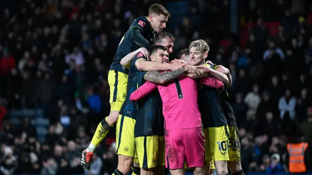 Newcastle players celebrate