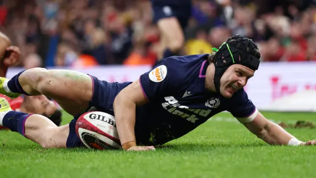  Darcy Graham scores Scotland's third try against Wales