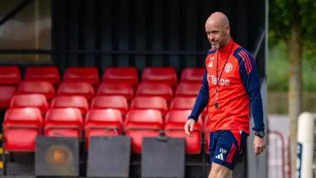 Erik ten Hag watches a Manchester United training session