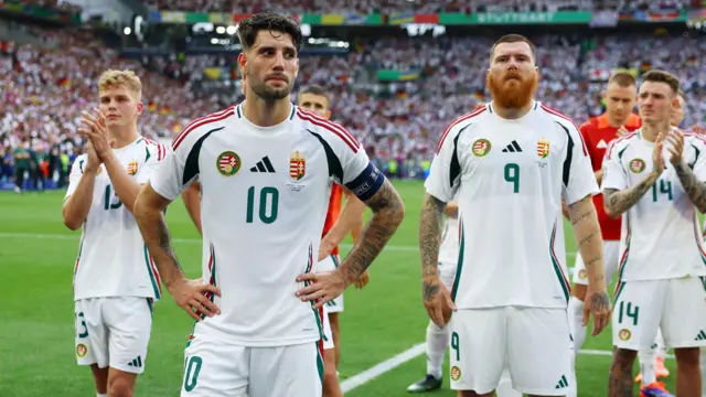 Hungary players look dejected after defeat to Germany