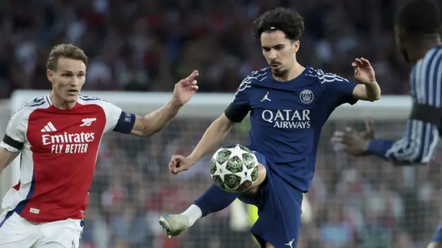 Vitinha in action for PSG against Arsenal