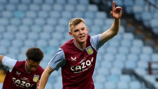 Rory Wilson celebrates scoring a goal