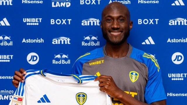 Josuha Guilavogui poses with the Leeds United shirt