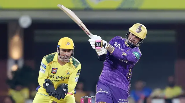 Sunil Narine batting for Kolkata Knight Riders while MS Dhoni keeps wicket for Chennai Super Kings