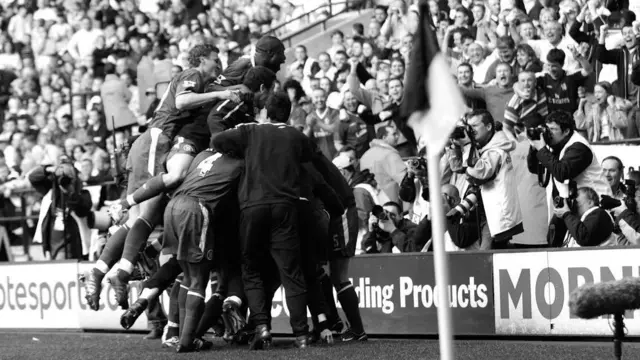 Chelsea celebrate a goal at Bolton