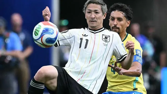 Japan's Daizen Maeda holds off Brazil's Marquinhos