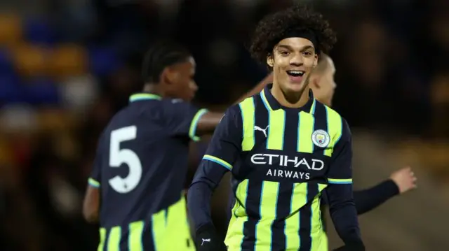 Luca Fletcher of Manchester City celebrates 
