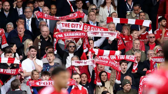 Nottingham Forest fans hold up scarves