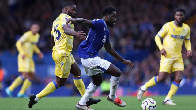 Orel Mangala of Everton beats Jeffrey Schlupp of Crystal Palace during the Premier League match between Everton FC and Crystal Palace FC at Goodison Park