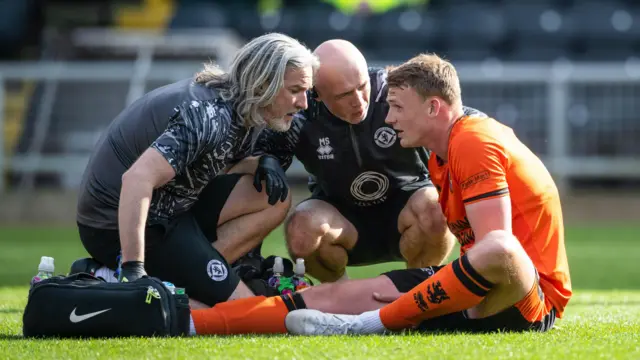 Sam Dalby receives treatment