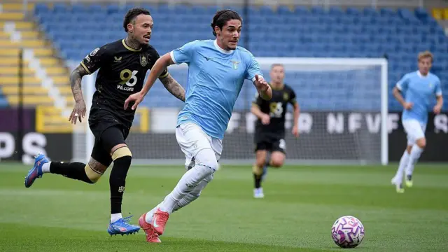 Mattia Xancellieri runs with the ball against Burnley